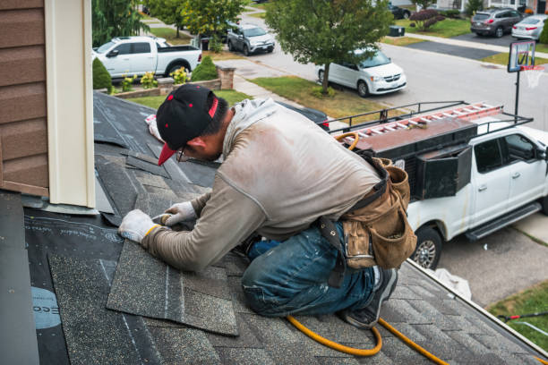 Professional Roofing technician working in Finley, ND
